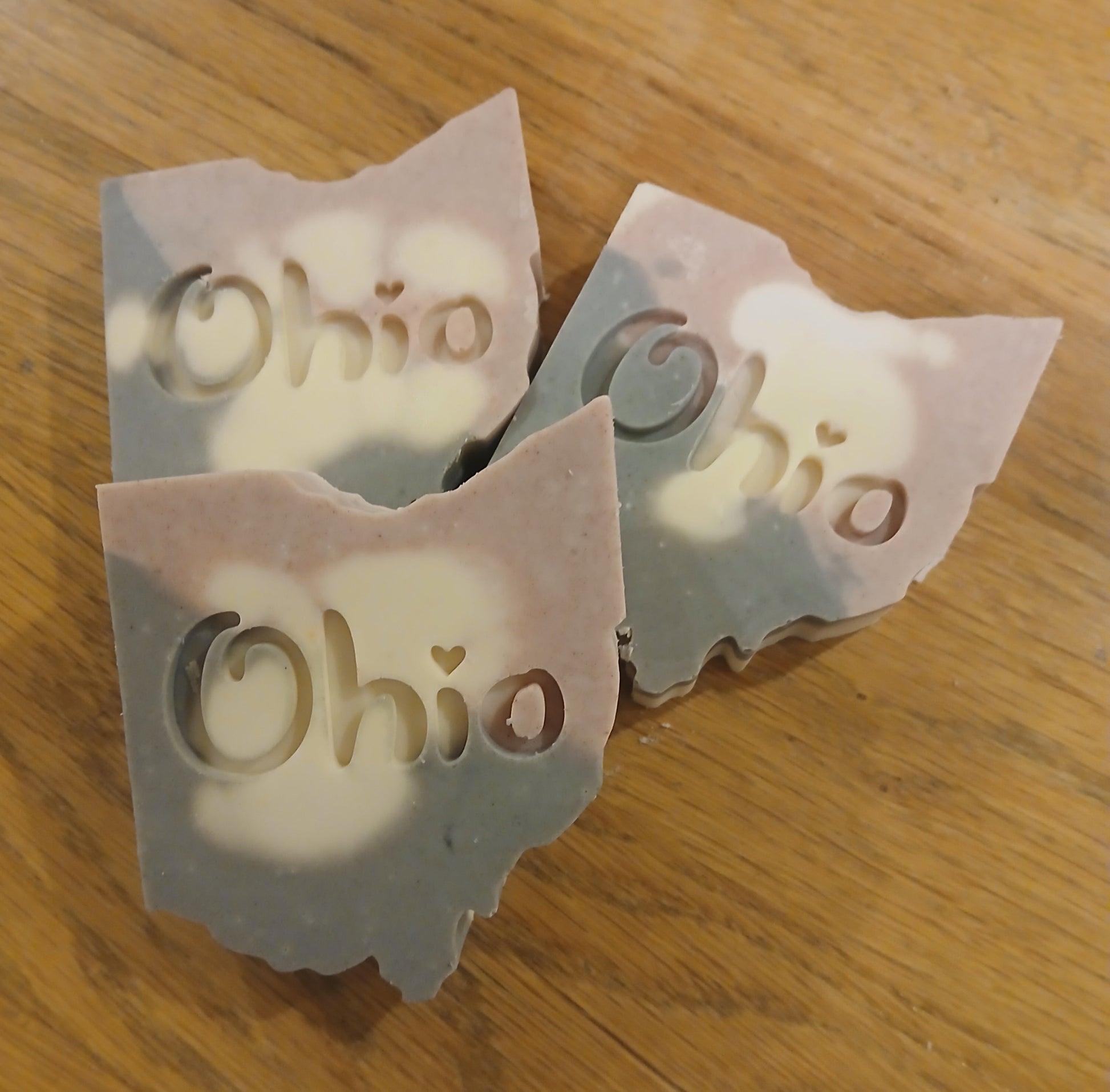 Soap shaped like OHIO with the word OHIO on it in the Ohio State Buckeyes' colors, scarlet and gray